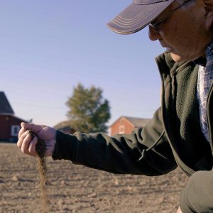 Man holding soil