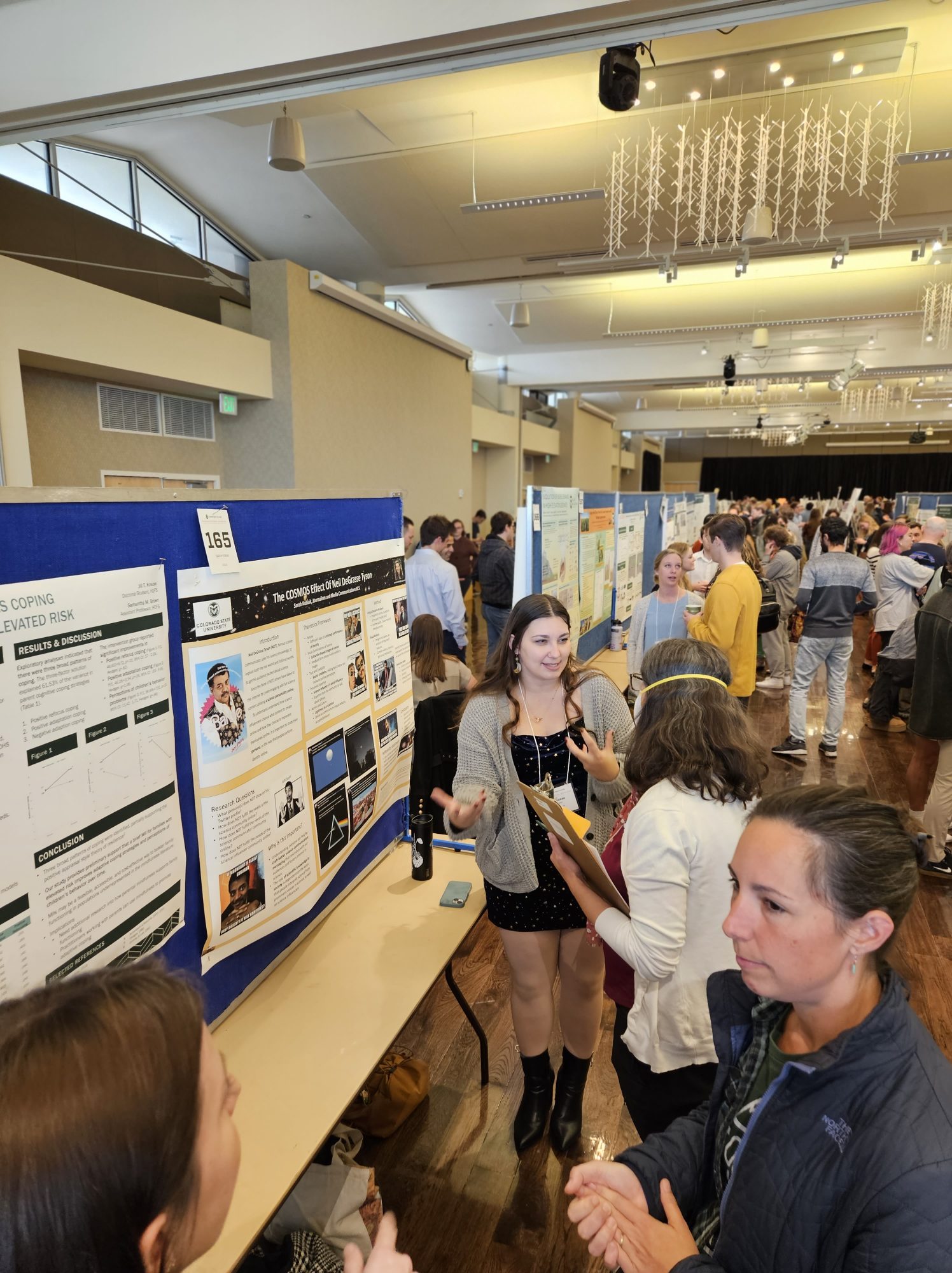 JMC students at Grad Showcase presenting posters